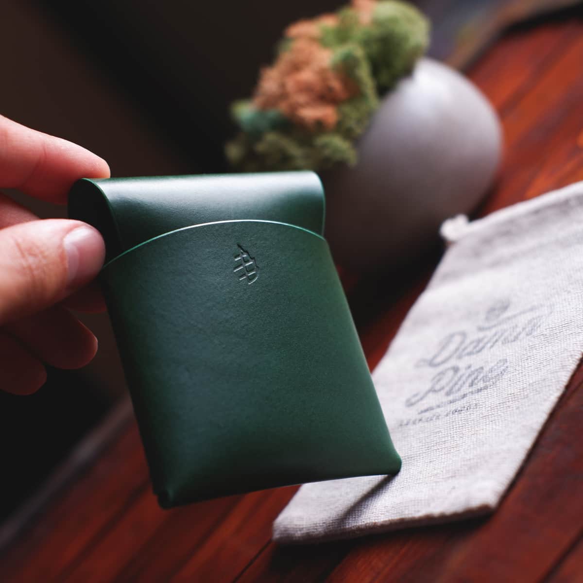 The Lodgepole Stitchless Wallet in Green Buttero leather closeup