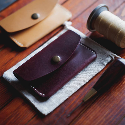Closeup of The Mountain Snap Wallet in Burgundy Cullata Cavallo full grain vegetable tanned leather
