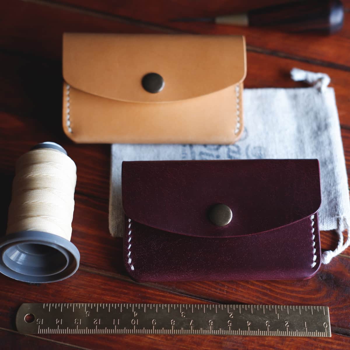 The Mountain Snap Wallets in Burgundy and Natural leathers