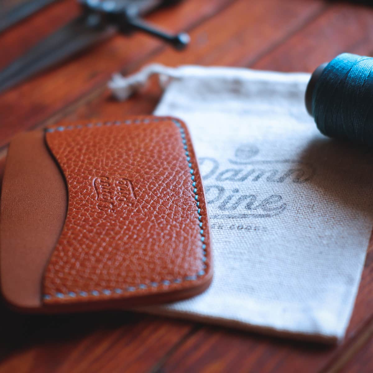 Closeup of The Arc Card Holder in Ruggine Koala and Cognac Tartufo full grain vegetable tanned leather