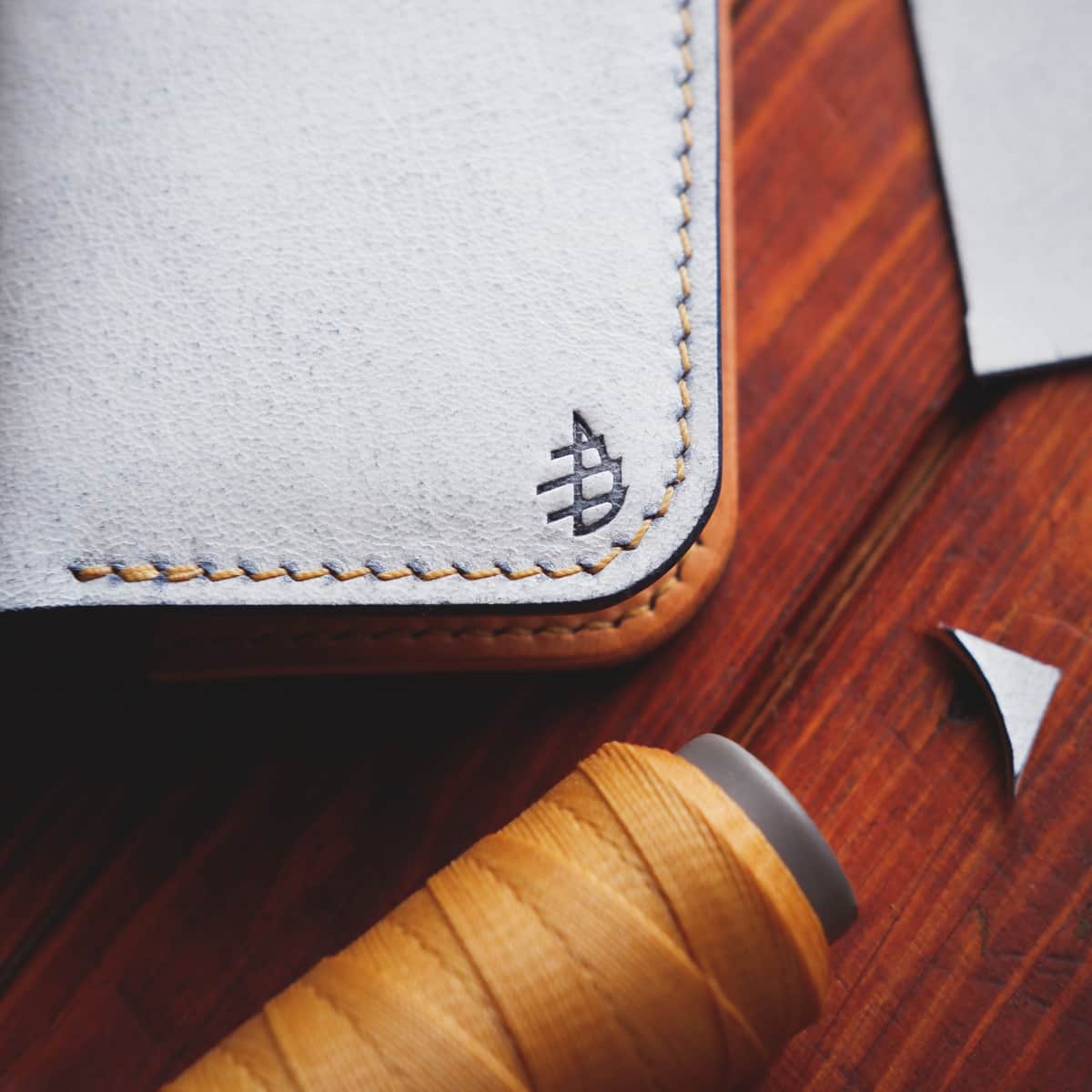 Closeup of the Damn Pine Leather Goods maker's mark