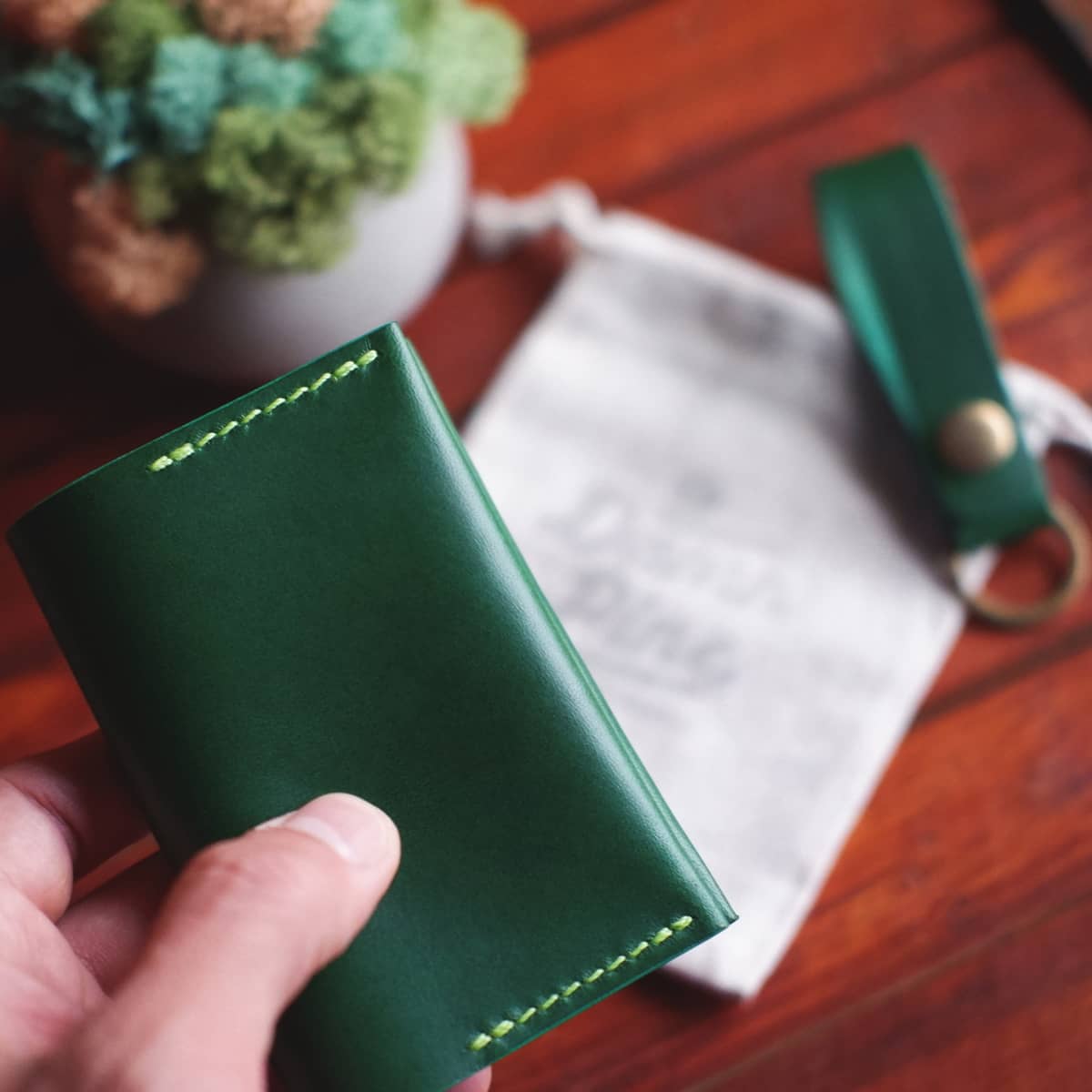 Exterior of The Mountain One Piece Bifold wallet in Green Buttero leather