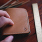 Closeup of The Mountain Open Top Bifold wallet in Buttero full grain vegetable tanned leather