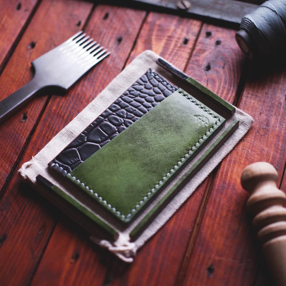 Tabletop view of The Scots Card Holder in Brown Crocco Embossed and Militare Italico vegetable tanned leather