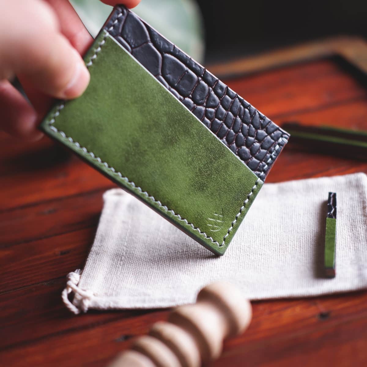 Closeup of The Scots Card Holder in Brown Crocco Embossed and Militare Italico vegetable tanned leather