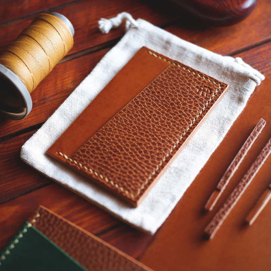 Tabletop view of The Scots Card Holder in Nevada Tan and Brown Dollaro vegetable tanned leathers
